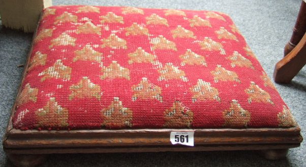 Appraisal: A pair of Victorian low oak framed foot stools with