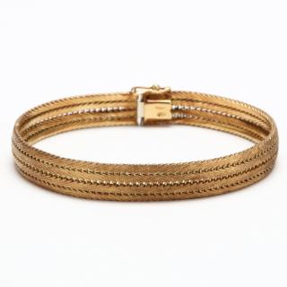 Appraisal: KT Gold Bracelet the flexible mesh bracelet terminating in an