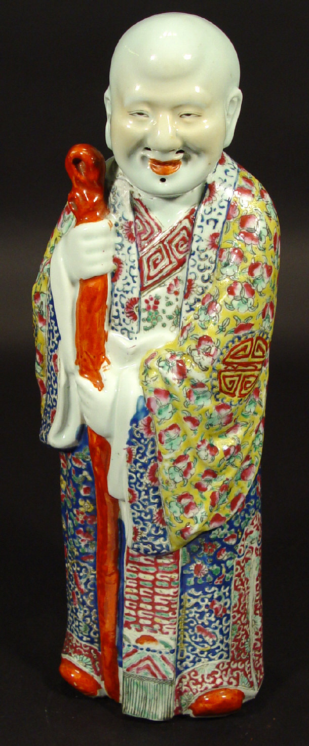 Appraisal: Large oriental porcelain figure enamelled in floral patterned robes impressed