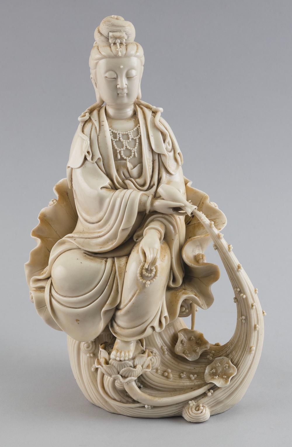 Appraisal: CHINESE BLANC DE CHINE PORCELAIN FIGURE OF GUANYIN TH CENTURY