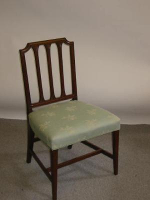 Appraisal: A SET OF THREE GEORGE III MAHOGANY SIDE CHAIRS of