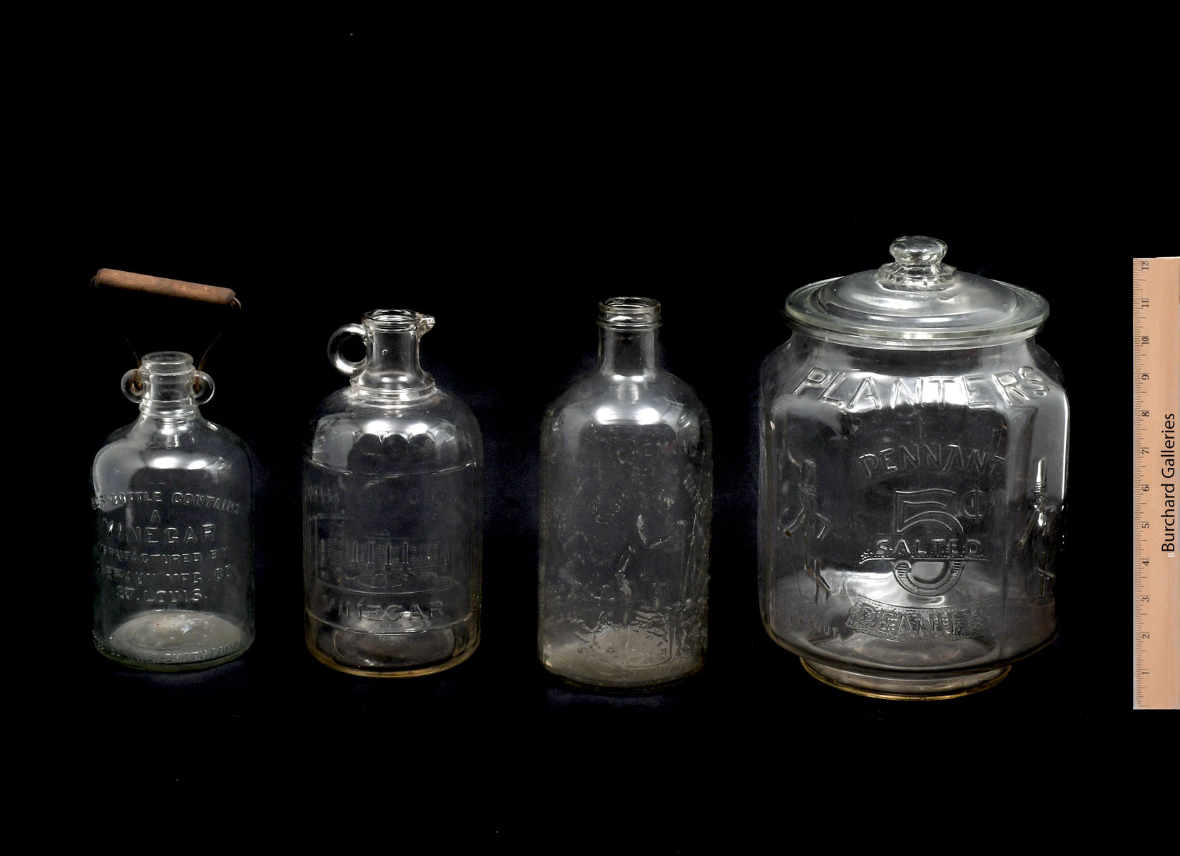 Appraisal: PC GLASS JUGS STORE DISPLAY Comprising - Large Planter's Peanut