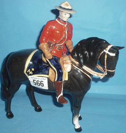 Appraisal: Beswick Canadian mountie on dark brown horse