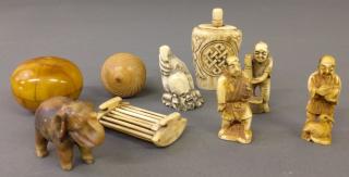 Appraisal: Netsuke Four bone netsukes h perfume bottle carved acorn etc