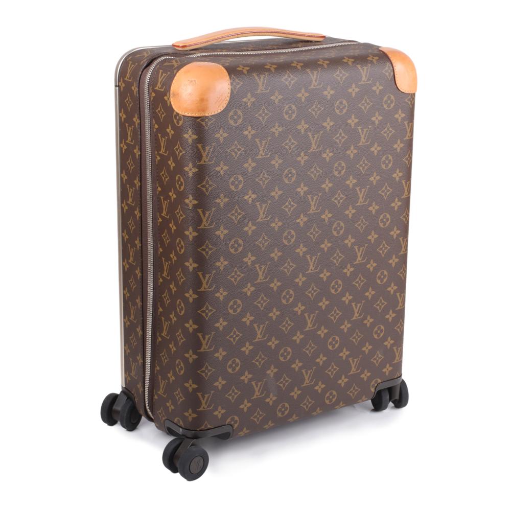 Appraisal: Louis Vuitton Monogram Horizon rolling luggage suitcase canvas coated with