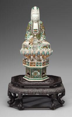 Appraisal: Chinese famille verte biscuit Guanyin two-piece construction the deity with