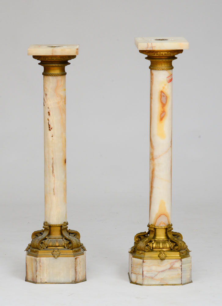 Appraisal: TWO SIMILAR NAPOLEON III GILT-METAL-MOUNTED ONYX PEDESTALS Each shaft with