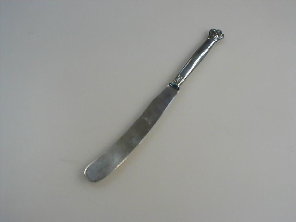 Appraisal: A Victorian silver knife with cartouche knop and curved blade