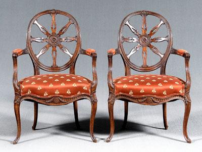 Appraisal: Pair George III style armchairs mixed woods with carved crest