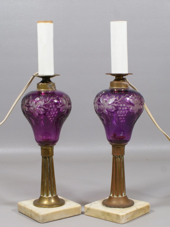 Appraisal: Pair of amethyst cut to clear oil lamps with brass