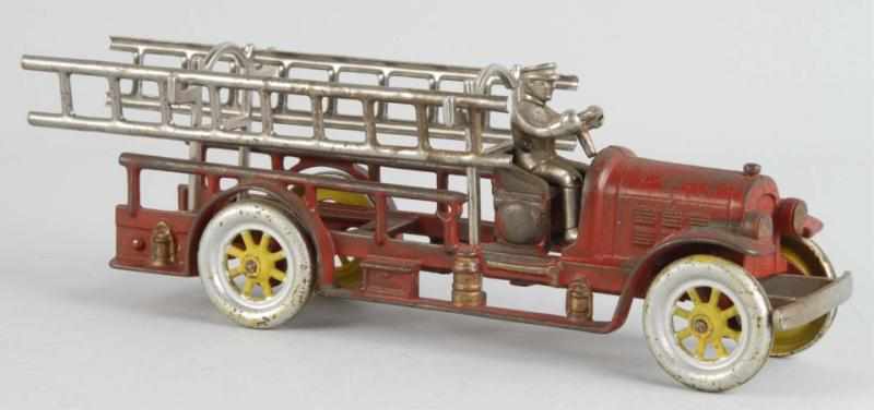 Appraisal: Cast Iron Kenton Fire Ladder Wagon Toy Description American Marked