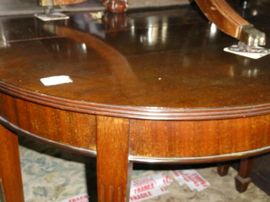 Appraisal: A Georgian style mahogany three sectional 'D' end dining table