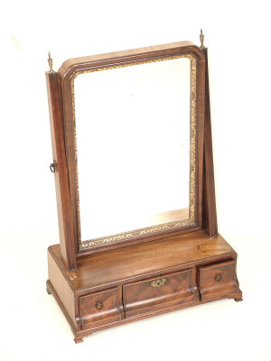 Appraisal: A George III mahogany toilet mirror circa the shaped plate