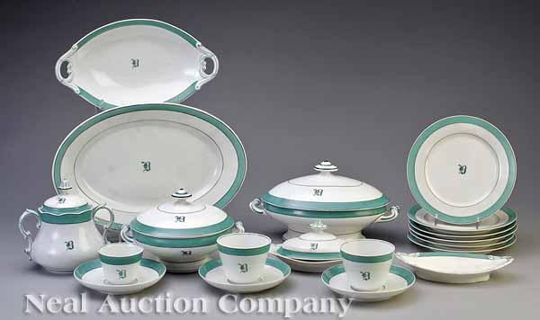 Appraisal: A Large French Limoges Porcelain Dinner Service c decorated with