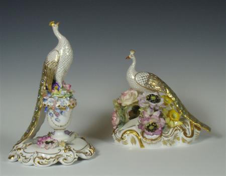 Appraisal: A group of two Royal Crown Derby figures of peacocks