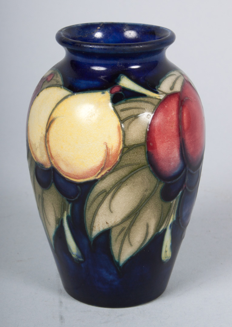 Appraisal: Moorcroft pottery miniature vase second quarter- th century cobalt ground