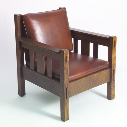 Appraisal: STICKLEY BROTHERS Armchair with three under-arm slats and drop-in spring