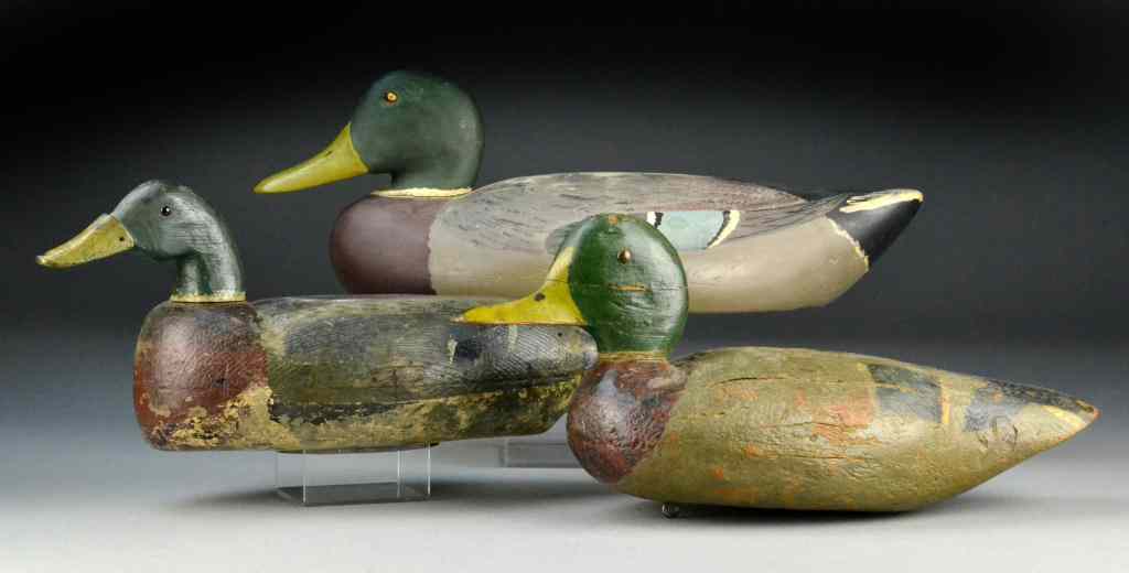 Appraisal: Mallard Drake DecoysPolychrome painted with glass and metal eyes one