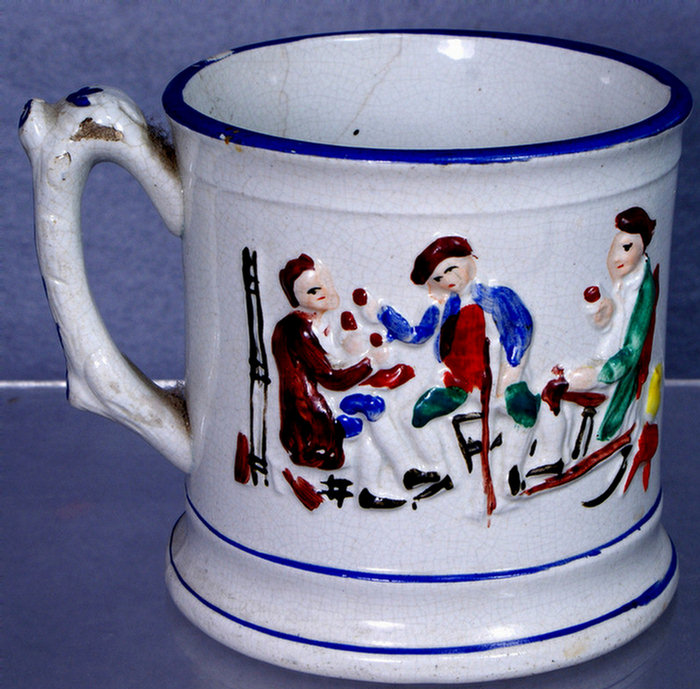 Appraisal: Staffordshire frog mug outside with embossed tavern scene Y-shaped hairline