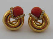 Appraisal: A fine pair of coral and diamond ear clips stamped