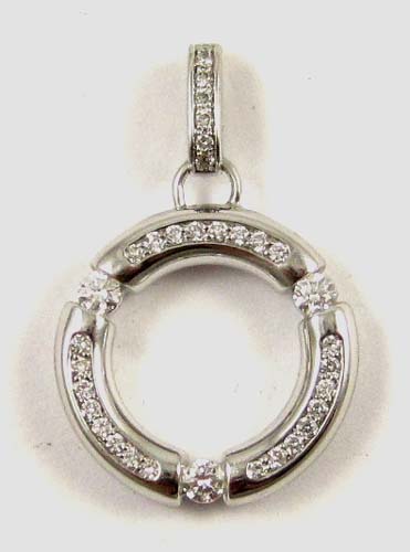 Appraisal: DIAMOND AND FOURTEEN KARAT WHITE GOLD PENDANT The open ring