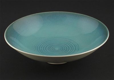 Appraisal: A Wedgwood earthenware shallow bowl designed by Norman Wilson matt