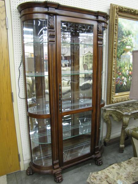 Appraisal: Pulaski Curved Glass China Cabinet with Paw Feet