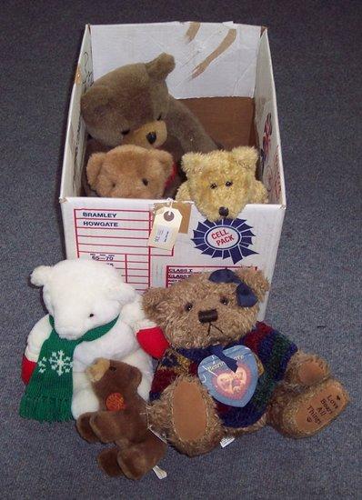 Appraisal: A singing teddy bear together with six further teddy bears