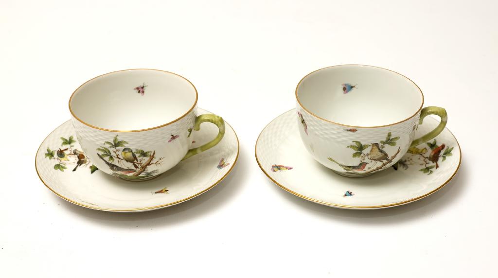 Appraisal: PAIR OF HEREND PORCELAIN BREAKFAST CUPS AND SAUCERS each painted