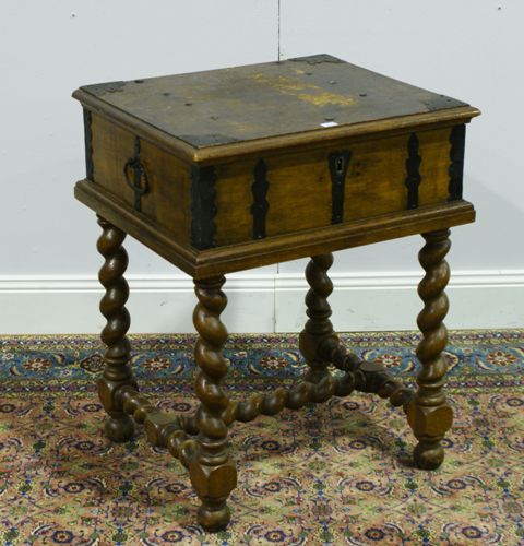 Appraisal: A late th century oak and iron bound chest on