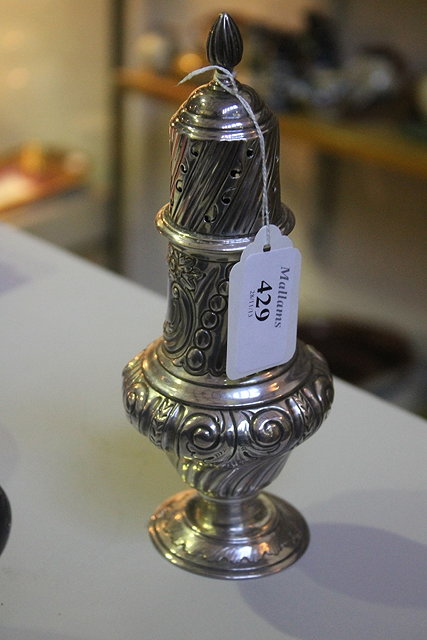 Appraisal: A SILVER CASTER of baluster form on pedestal foot with