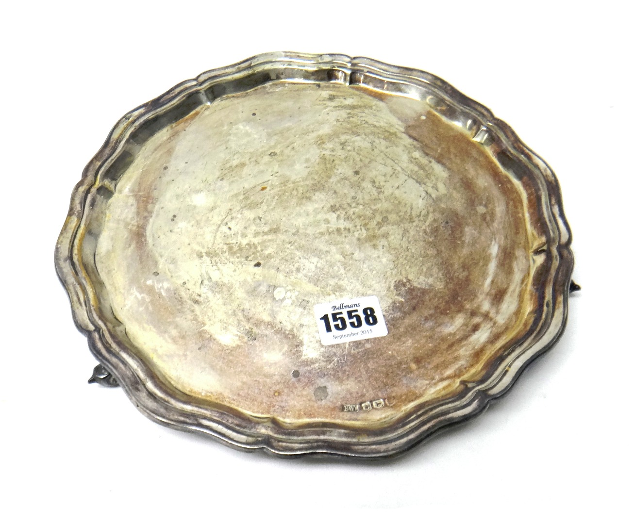 Appraisal: A silver salver of shaped circular form with a pie-crust