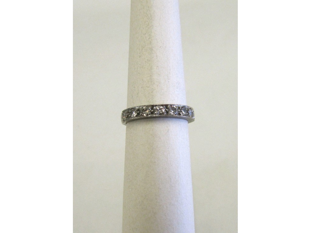 Appraisal: Eighteen carat white gold diamond half hoop ring