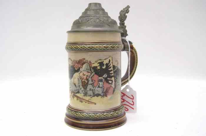 Appraisal: METTLACH BEER STEIN with print under glaze with pewter lid