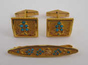 Appraisal: A pair of yellow metal tests carat gold turquoise cufflinks