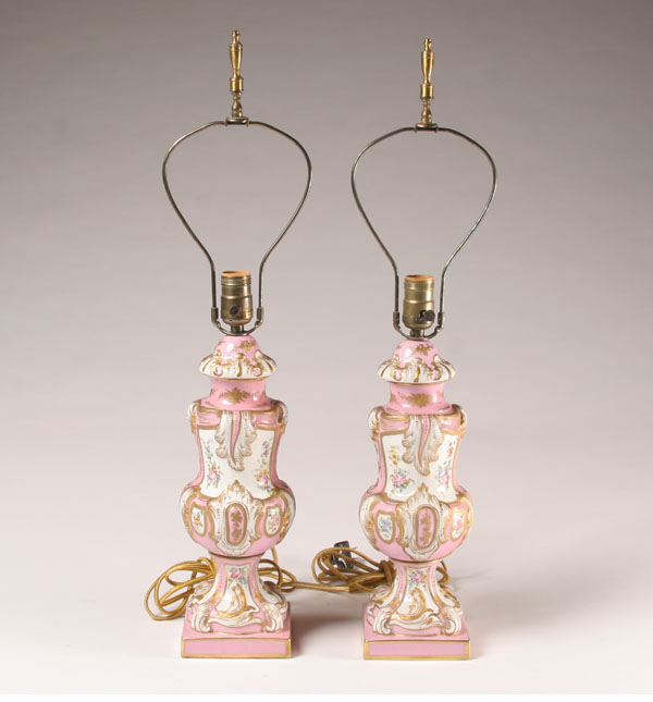 Appraisal: Pair porcelain hand painted lamps embossed surface floral and gilt