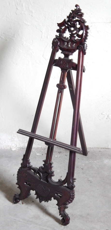 Appraisal: A reproduction rococo mahogany easel stand cm high