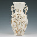 Appraisal: Double handled vase with molded floral motif finished in white