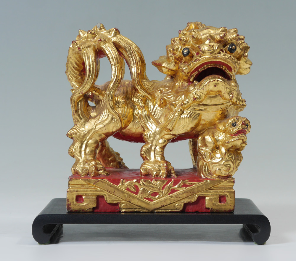 Appraisal: GILDED FOO LION WITH CUBS Heavy composite concrete figure of