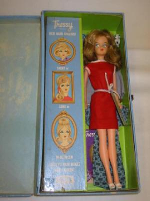 Appraisal: A plastic Tressy doll with painted face and light brown