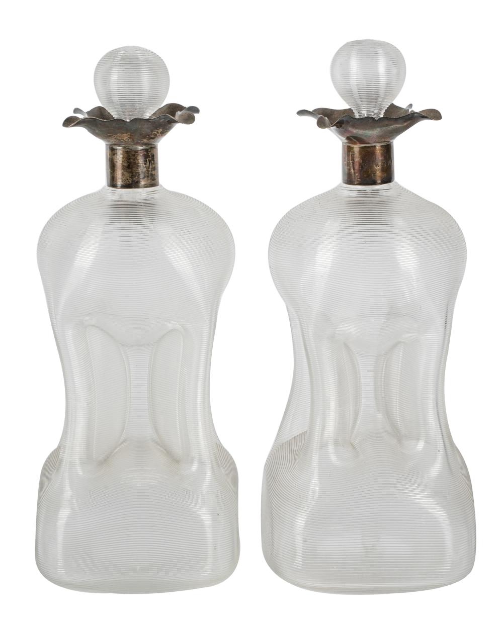 Appraisal: PAIR OF VICTORIAN STERLING-MOUNTED GLASS DECANTERSLondon illegible maker's marks inches