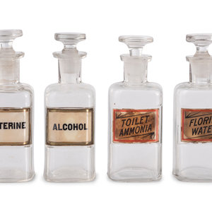 Appraisal: Four Glass Apothecary Bottles with printed labels adhered to the