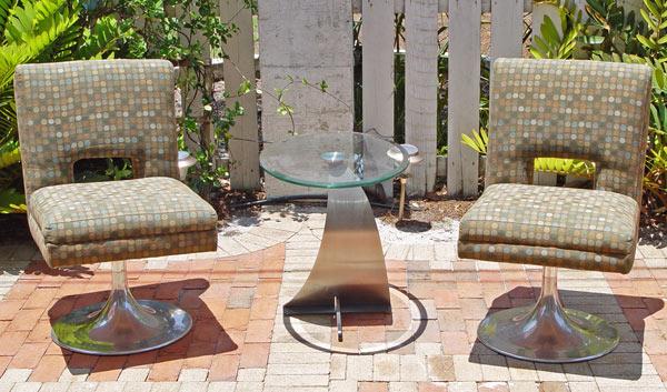 Appraisal: PAIR OF CONTEMPORARY ROMANO SWIVEL CHAIRS AND STAINLESS AND GLASS