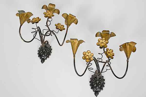 Appraisal: Wrought Iron Three Light Candle Sconces A pair of cast