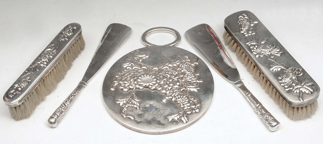 Appraisal: THREE PIECES OF CHINESE SILVER dressing table ware comprising a