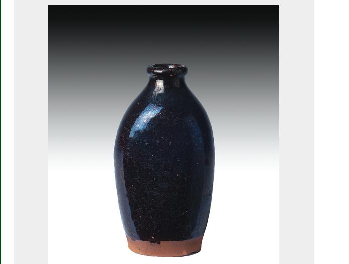 Appraisal: NEW ENGLAND MANGANESE BROWN-GLAZED REDWARE FLASK EARLY NINETEENTH CENTURY Height