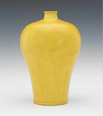 Appraisal: A Meiping Vase With Hongzhi Marks Yellow glaze over incised