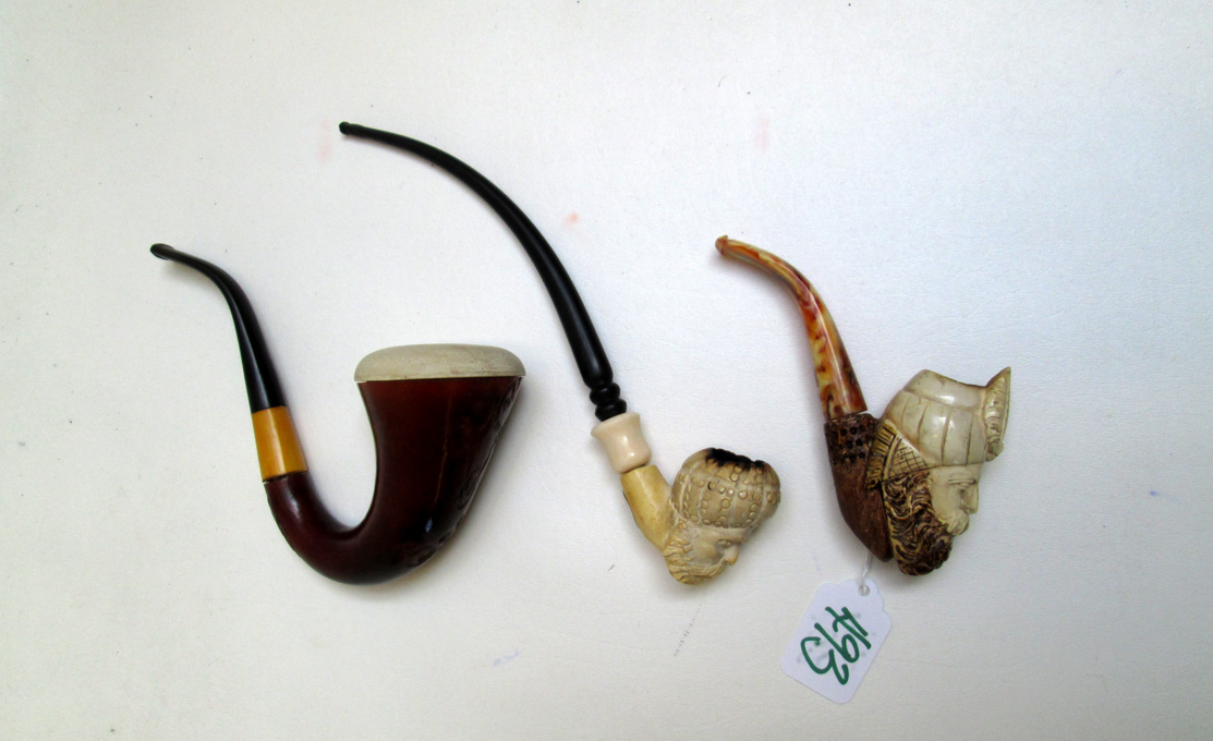 Appraisal: THREE MEERSCHAUM PIPES carved bowls in the form of Turkish