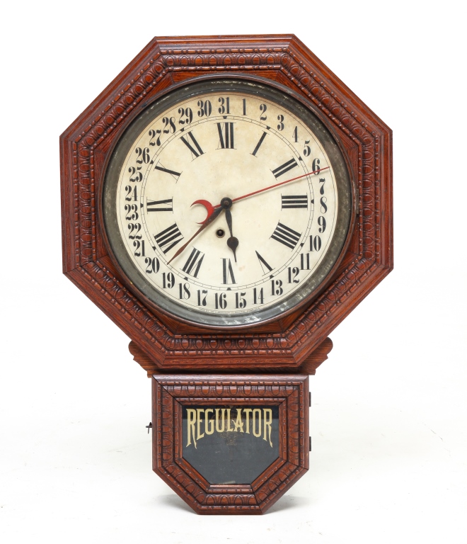 Appraisal: AMERICAN INGRAHAM REGULATOR WALL CLOCK Ca oak case Pressed wood