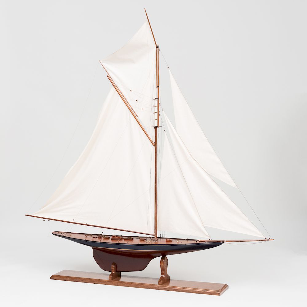 Appraisal: Large Model of a Painted and Brass-Mounted Mahogany Yacht Mounted